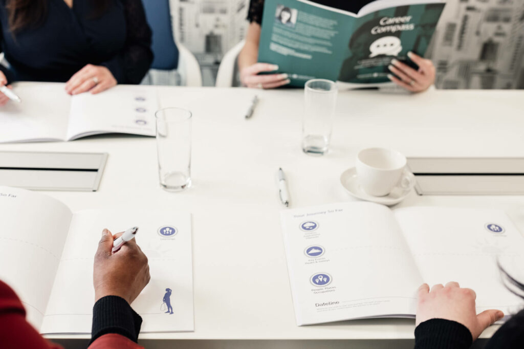 Career Compass Workbook by Antoinette Oglethorpe being used by employees