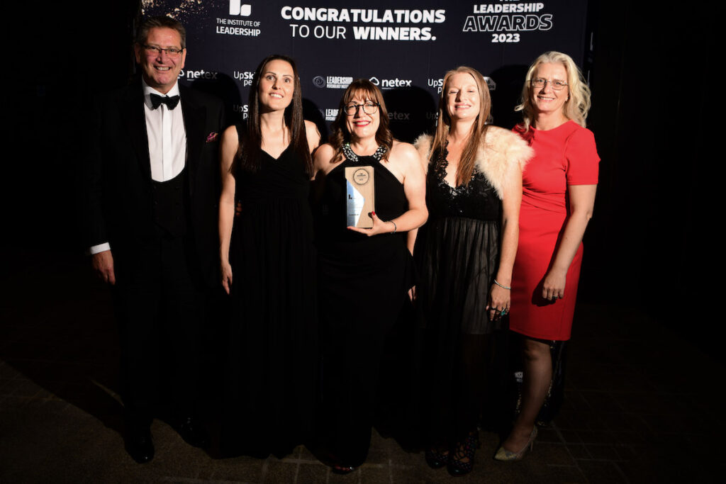 The leadership awards - Team AO with Antoinette accepting the leadership book of the year award runner up place