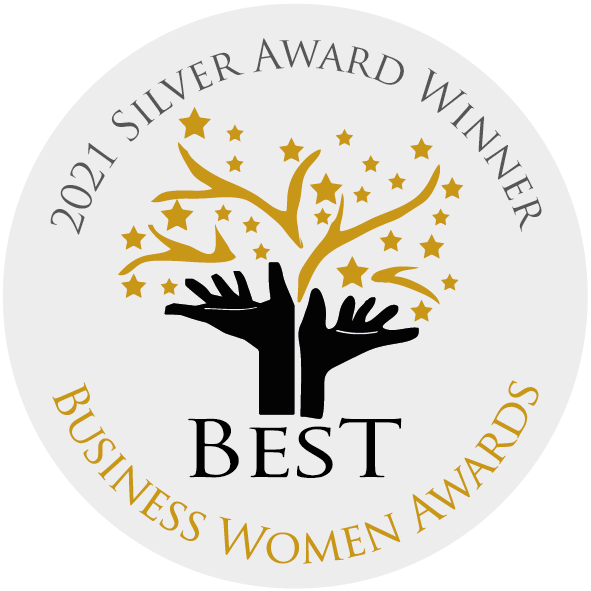 A circular badge with "2021 Silver Award Winner" at the top, two black hands reaching for gold stars in the centre, and "BEST Business Women Awards" written at the bottom.