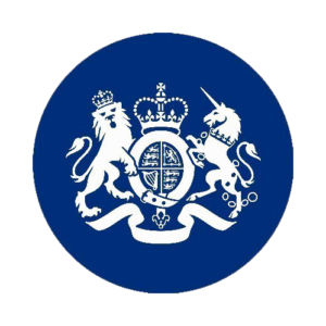 A blue circular emblem featuring a white crowned lion on the left and a white unicorn on the right, standing on either side of a crowned shield with a decorative ribbon below.