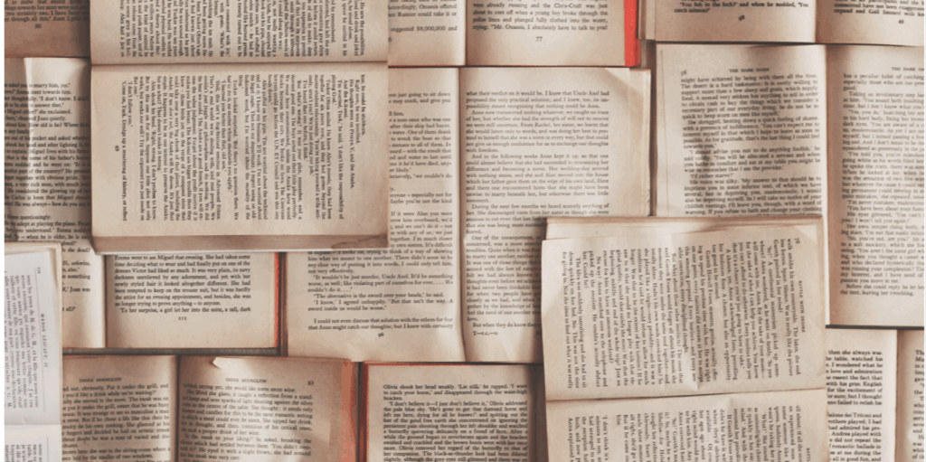 A collection of open books laid out overlapping each other, displaying various pages filled with text in different typefaces and orientations. The books create a textured, literary background that evokes the spirit of positive mentoring and shared knowledge.