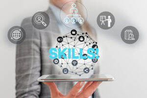 A person in business attire holds a tablet with the word 